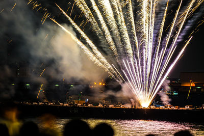 Firework display at night