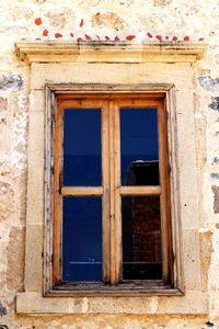 Low angle view of window of old building
