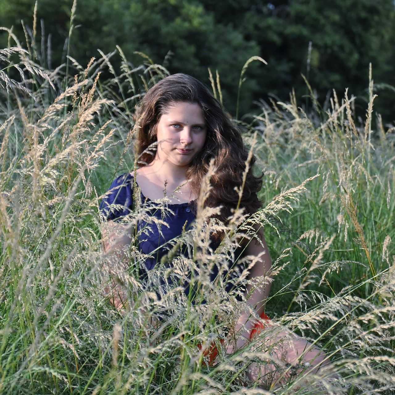 plant, portrait, one person, land, nature, growth, field, women, grass, looking at camera, leisure activity, young adult, front view, lifestyles, day, real people, contemplation, girls, hair, hairstyle, teenager, outdoors, beautiful woman
