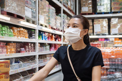 Portrait of woman standing in store