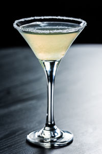 Close-up of beer glass on table