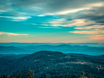 Scenic view of landscape against sky during sunset