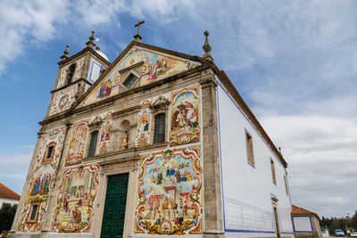 Low angle view of church against sky