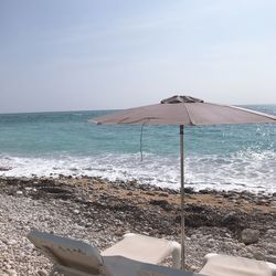 Scenic view of beach against sky