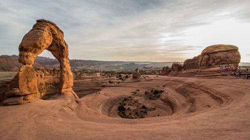 Rock formations in desert against sky