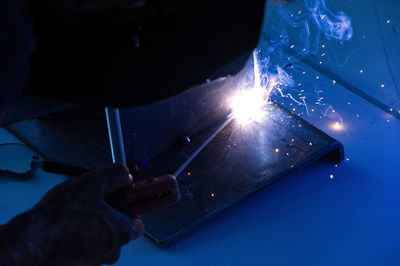 Man working on metal