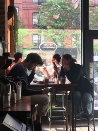 Woman sitting in restaurant