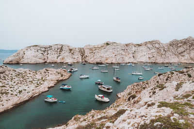 Multiples boats anchored in a bay in the south of france