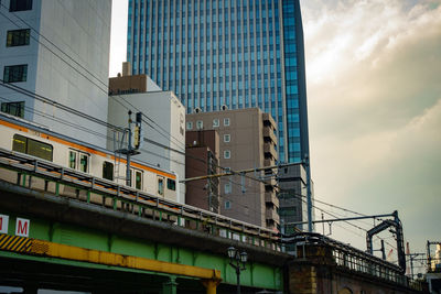 Low angle view of skyscrapers against sky