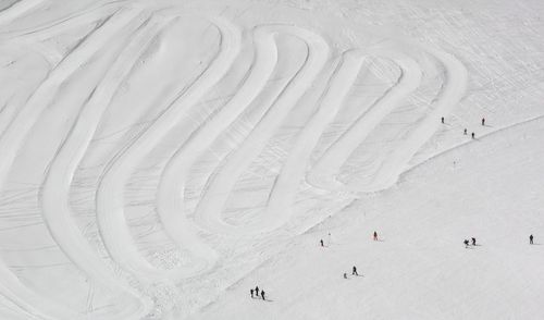 High angle view of people on snow