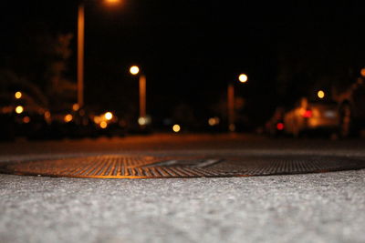 Surface level of illuminated street at night