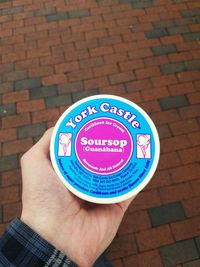 Close-up of hand holding text