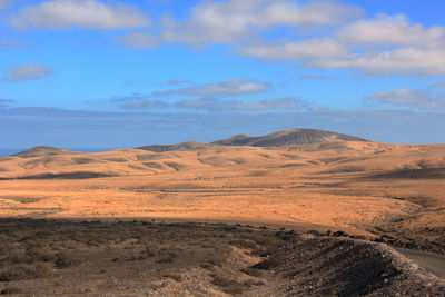 Scenic view of desert against sky