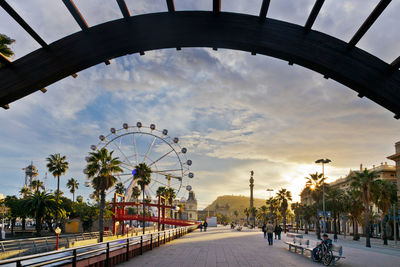 View of ferris wheel in city