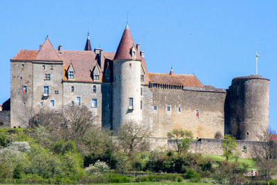 Chateauneuf, france, april 17, 2022. the chateau de chateauneuf-en-auxois is a fortress.