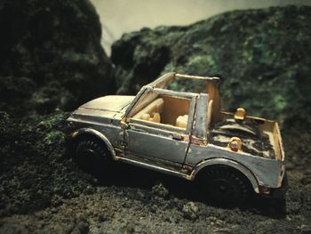 Abandoned toy car on land