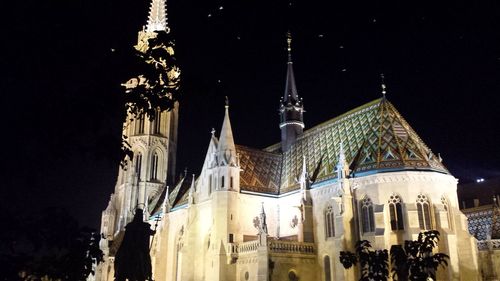 Low angle view of cathedral against sky at night