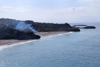 Scenic view of beach against sky