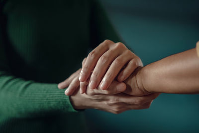 Close-up of hands on finger