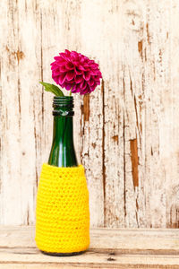 Close-up of flower vase on table