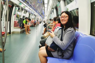 Woman sitting in train