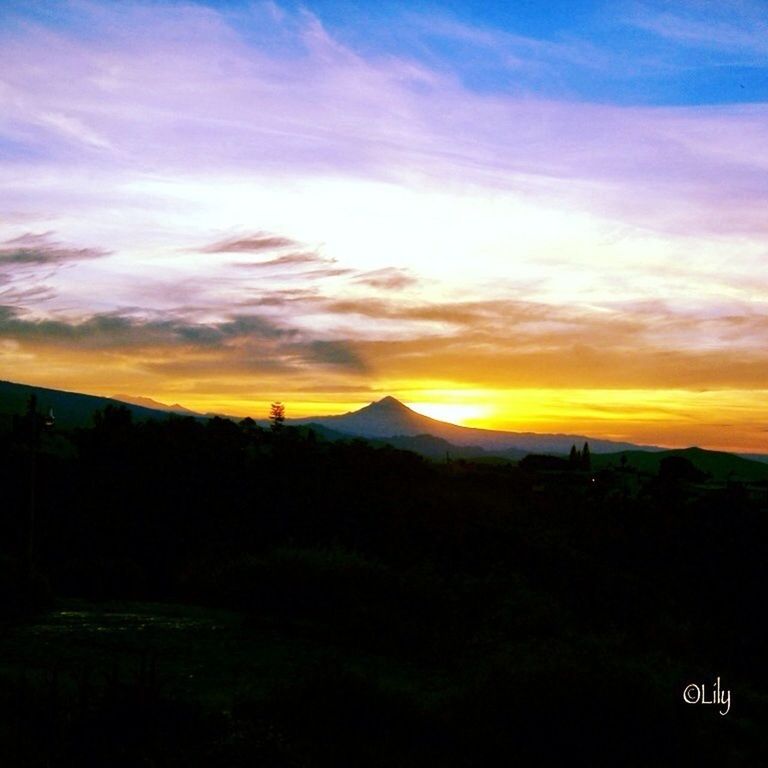 sunset, silhouette, orange color, scenics, sky, beauty in nature, tranquil scene, tranquility, idyllic, cloud - sky, landscape, mountain, nature, dramatic sky, cloud, moody sky, outdoors, majestic, dusk, no people