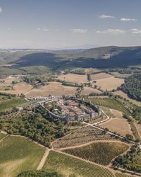 Aerial view of agricultural field against sky