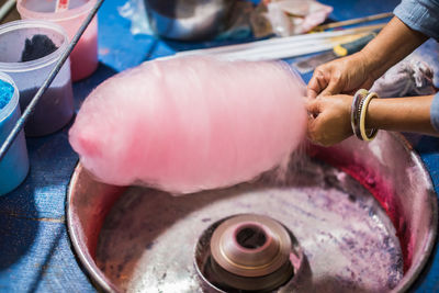 Close-up of man preparing food