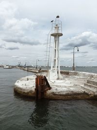 Pier over sea against sky