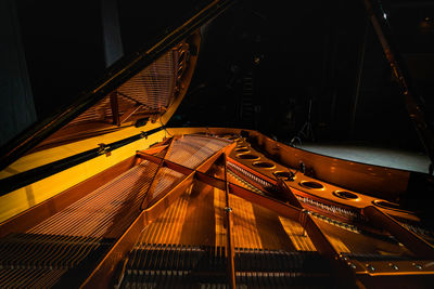 High angle view of illuminated escalator in building