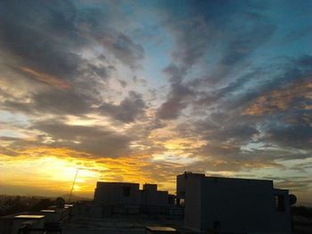 Scenic view of dramatic sky during sunset