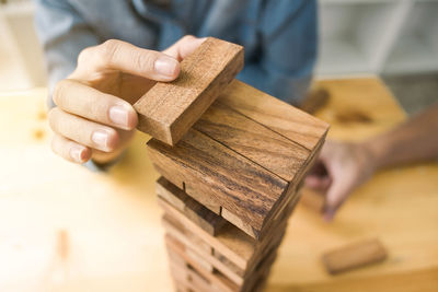 Close-up of man working on table