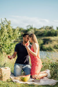 Budget-friendly cheap european honeymoon destinations. newlyweds couple in love on summer picnic