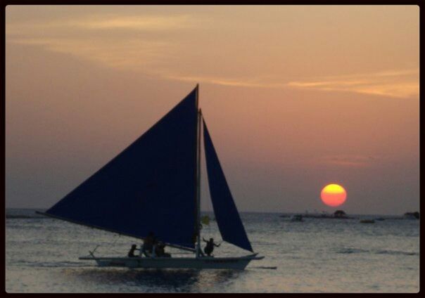 sea, sunset, water, horizon over water, sky, orange color, sun, transfer print, beach, scenics, auto post production filter, beauty in nature, tranquility, nature, tranquil scene, silhouette, waterfront, idyllic, rippled, nautical vessel