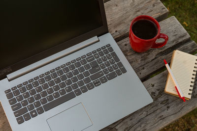 High angle view of coffee cup on table