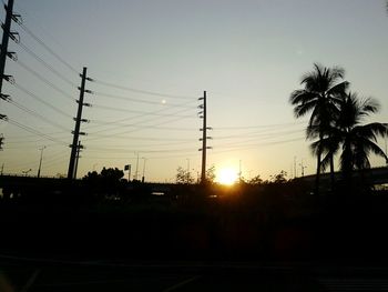 Electricity pylon at sunset