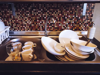 Close-up of coffee cups on table