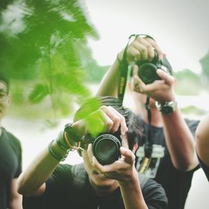 Man photographing with camera