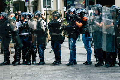 People standing on street in city