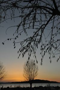 Scenic view of sea against sky at sunset