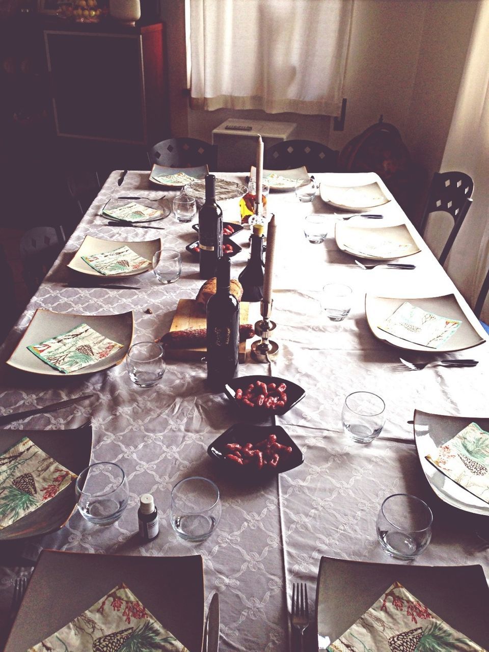 indoors, table, still life, high angle view, absence, chair, variation, home interior, no people, arrangement, empty, large group of objects, furniture, paper, restaurant, book, wood - material, day, choice, flooring