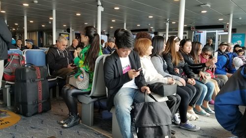 Group of people sitting in bus