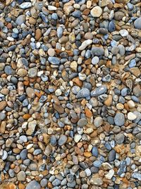 High angle view of stones on pebbles