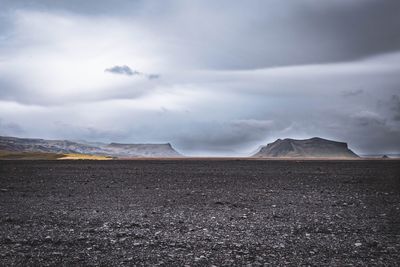 Scenic view of land against sky