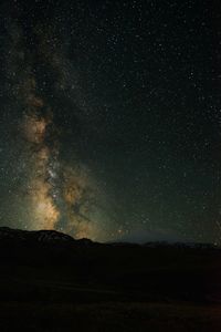 Scenic view of star field against sky at night