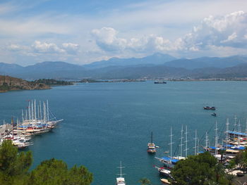 High angle view of sailboats in sea against sky