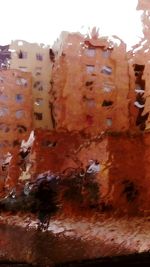 Close-up of damaged building against sky