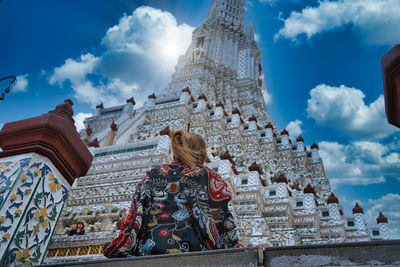 Low angle view of temple against building