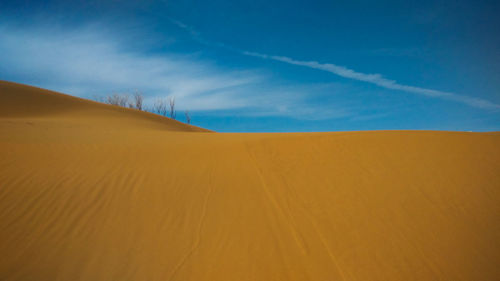 Scenic view of desert against sky