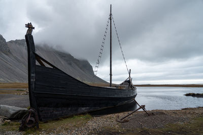 Boat in sea against sky